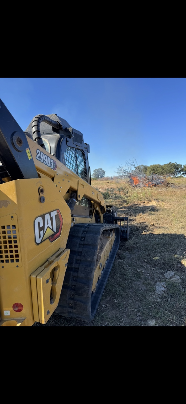 CAT tracked loader on open rural land